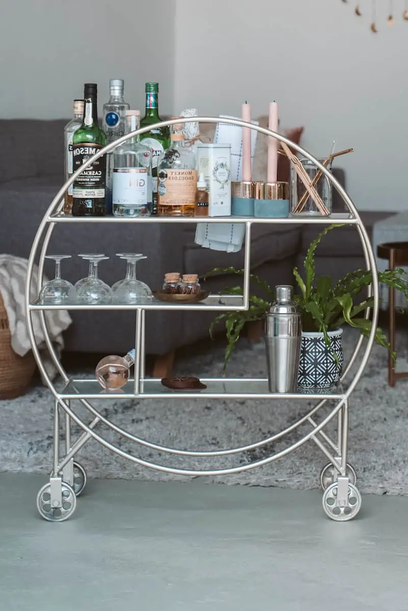 Ready to move into the adult world with a bar cart, but not sure where to start? Learn how to decorate a bar cart with this quick and easy guide.