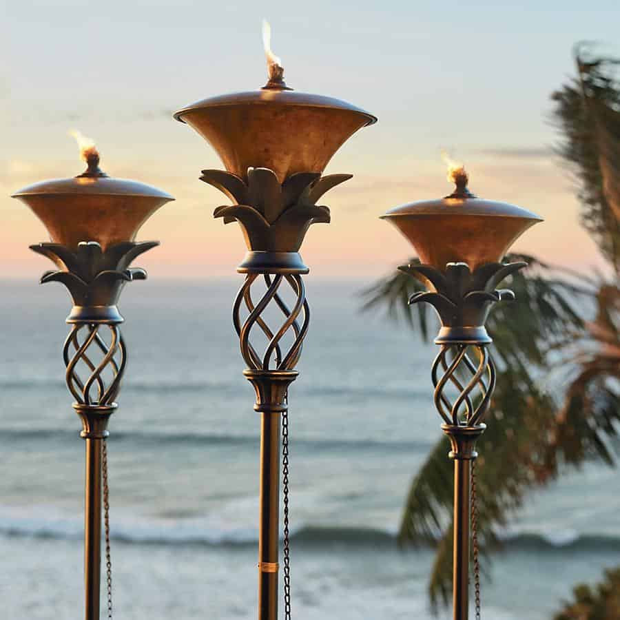 Enjoy your summer by keeping the mosquitos at bay and adding a whole lot of flair to your backyard bar with these must-have tiki torches.