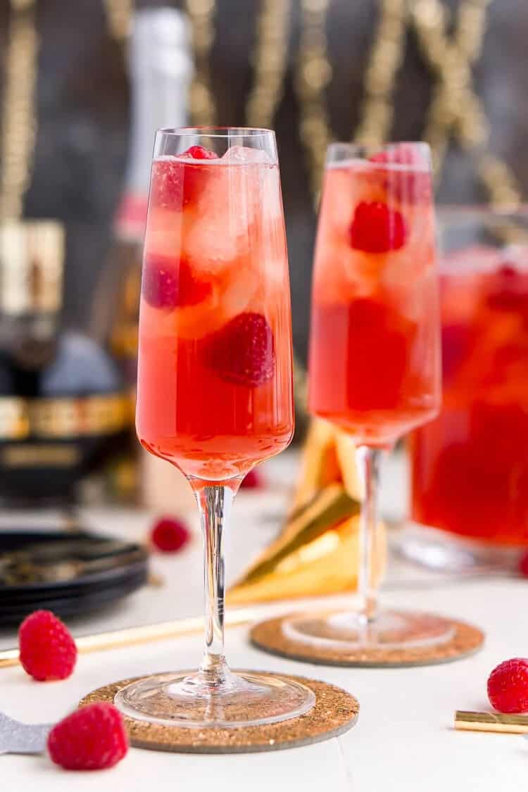 two glasses of beautiful red champagne punch